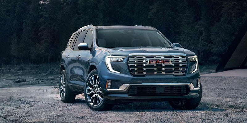 2026 GMC Acadia parked outdoors highlighting modern SUV styling