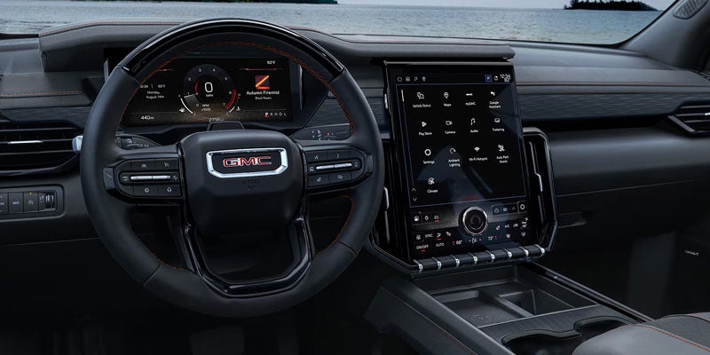 2026 GMC Acadia dashboard with large infotainment touchscreen display