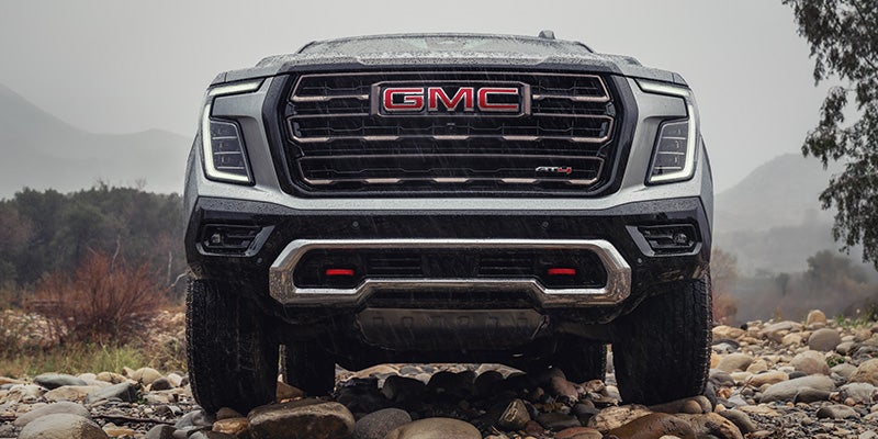 2026 GMC Yukon parked outdoors highlighting premium SUV styling